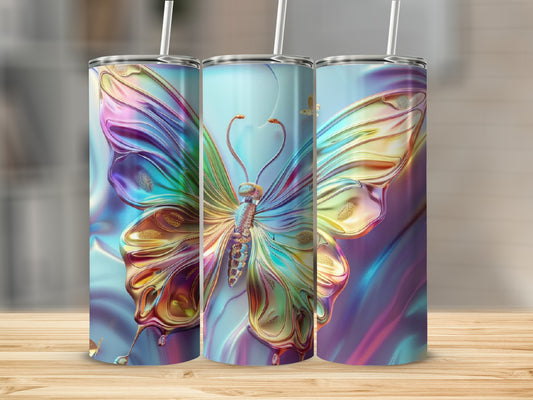 Iridescent butterfly design on three tumblers with straws.