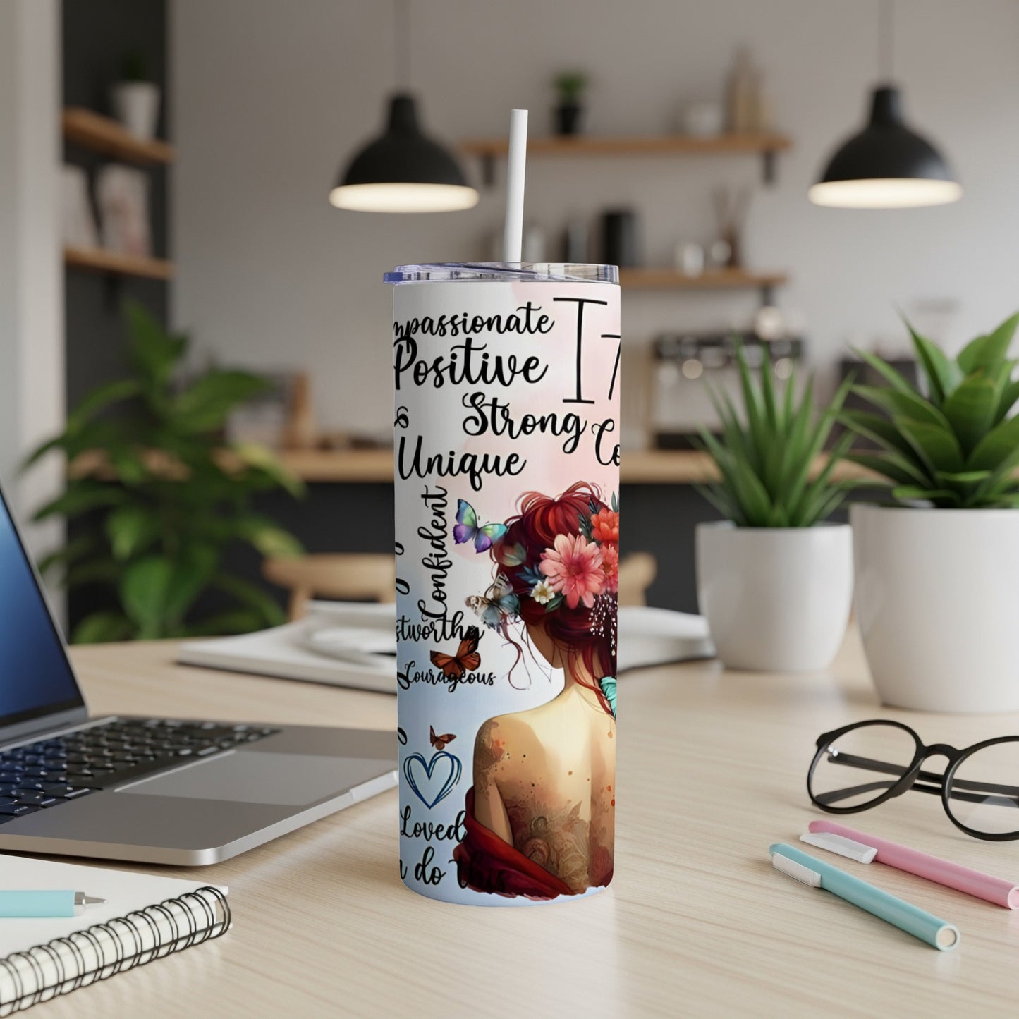 Tumbler with inspirational quotes and floral butterfly design.