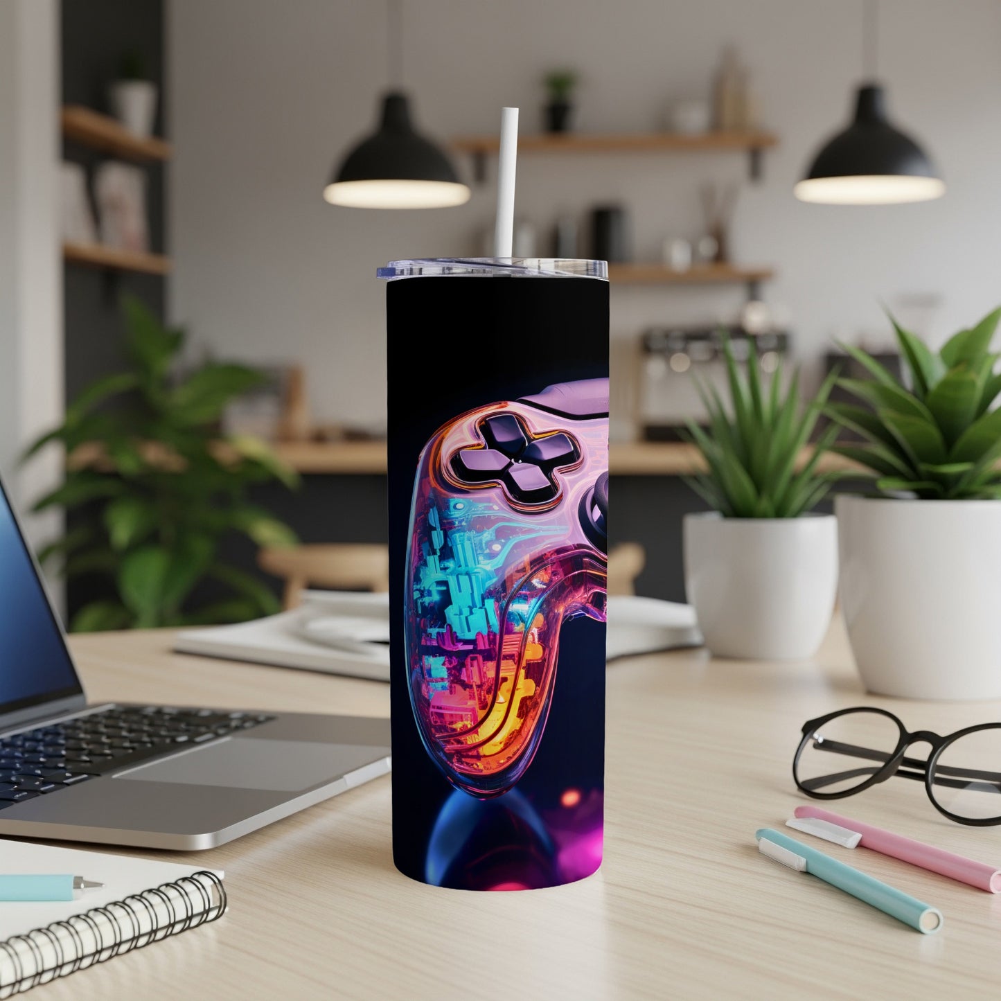 Glow-in-the-dark video game controller design on a sleek, black tumbler.