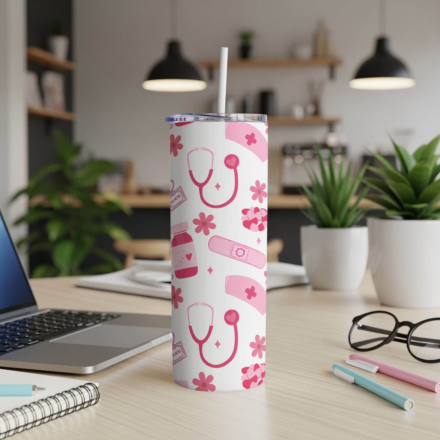 Pink medical pattern tumbler with stethoscope, hearts, and nurse cap.