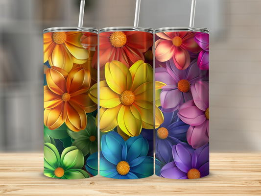 Three tumblers with vibrant floral designs in rainbow colors.