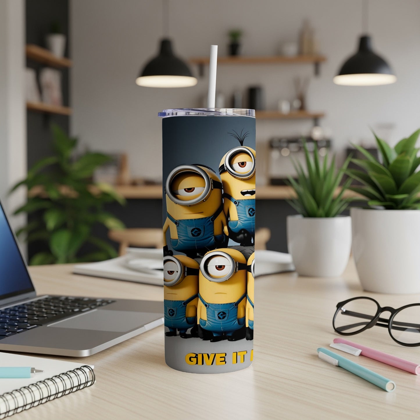 Minions characters on a tall tumbler cup with the text "GIVE IT".