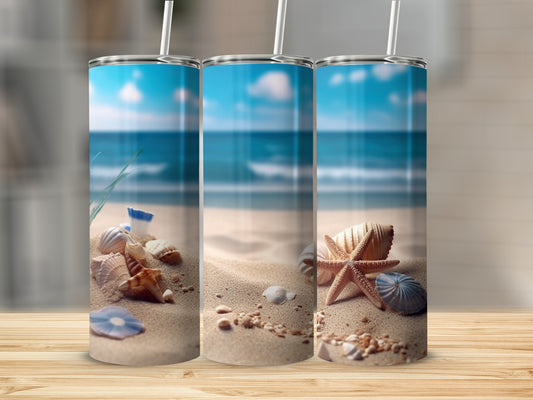 Three beach-themed tumblers with seashells and starfish on sand.