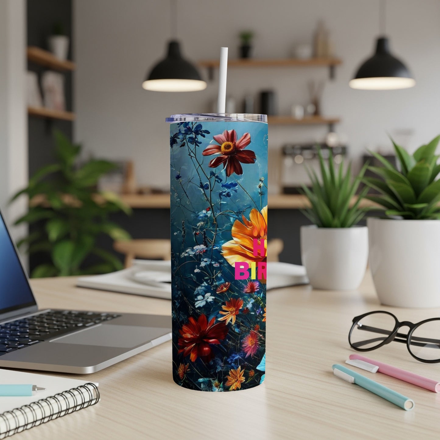Tall tumbler with floral design and "Happy Birthday" text.