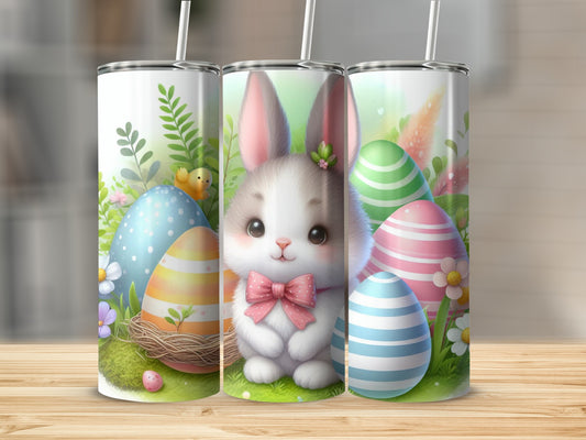 Easter bunny with colorful eggs and chicks on grass.