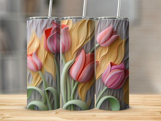 Three tumblers with a raised floral tulip design.