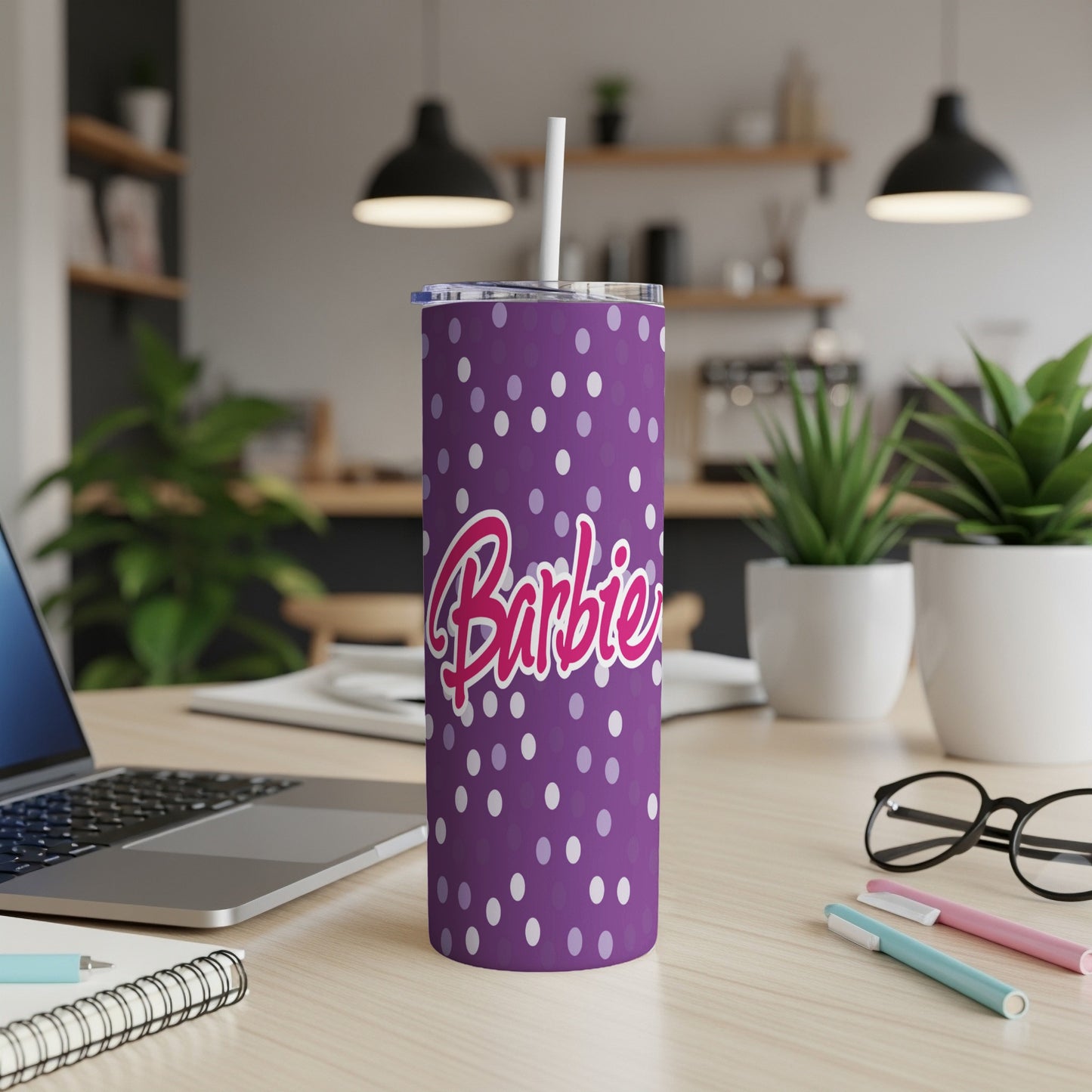 Purple tumbler with pink and white polka dots and "Barbie" logo.