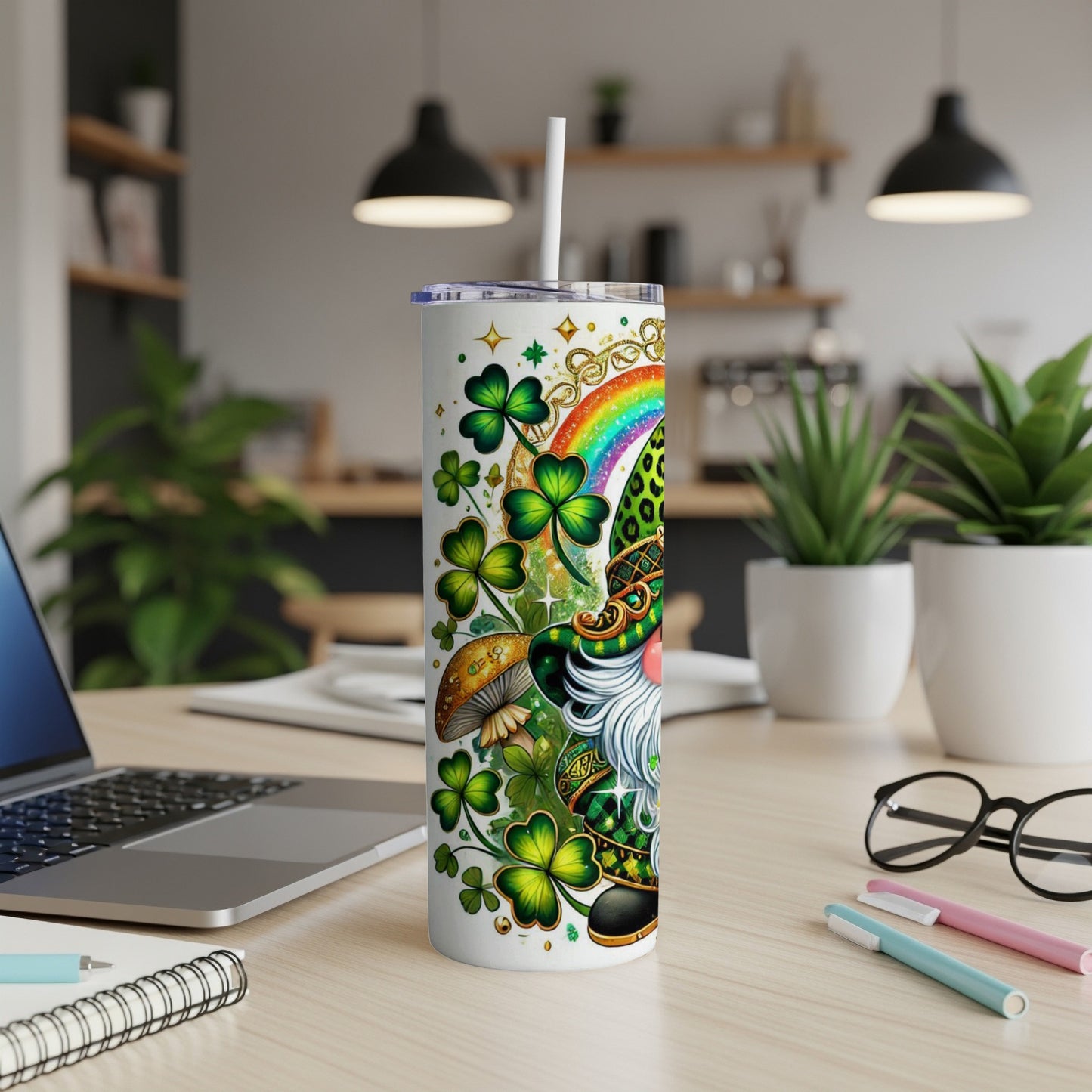 St. Patrick's Day gnome with shamrocks, mushrooms, and a rainbow pattern on a tumbler.