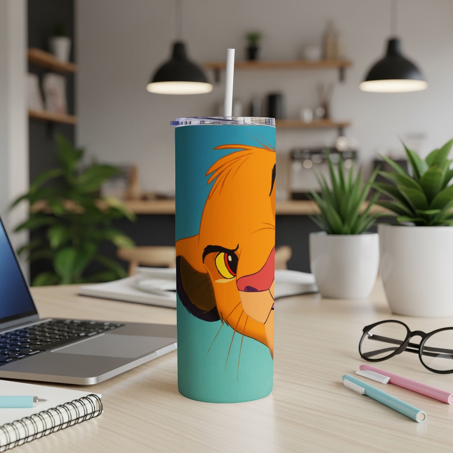 Simba from The Lion King on a teal tumbler with straw.