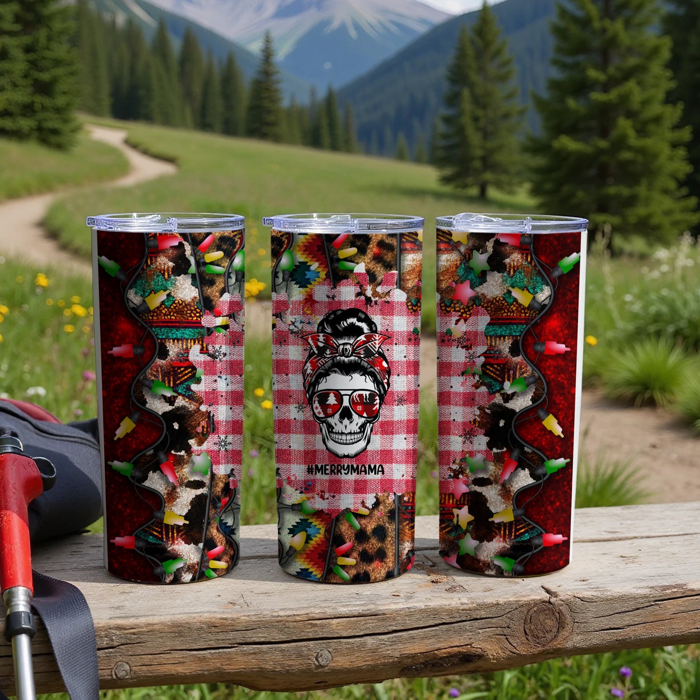 Three tumblers with checkered pattern, skull graphic, and "Merry Mama" text.