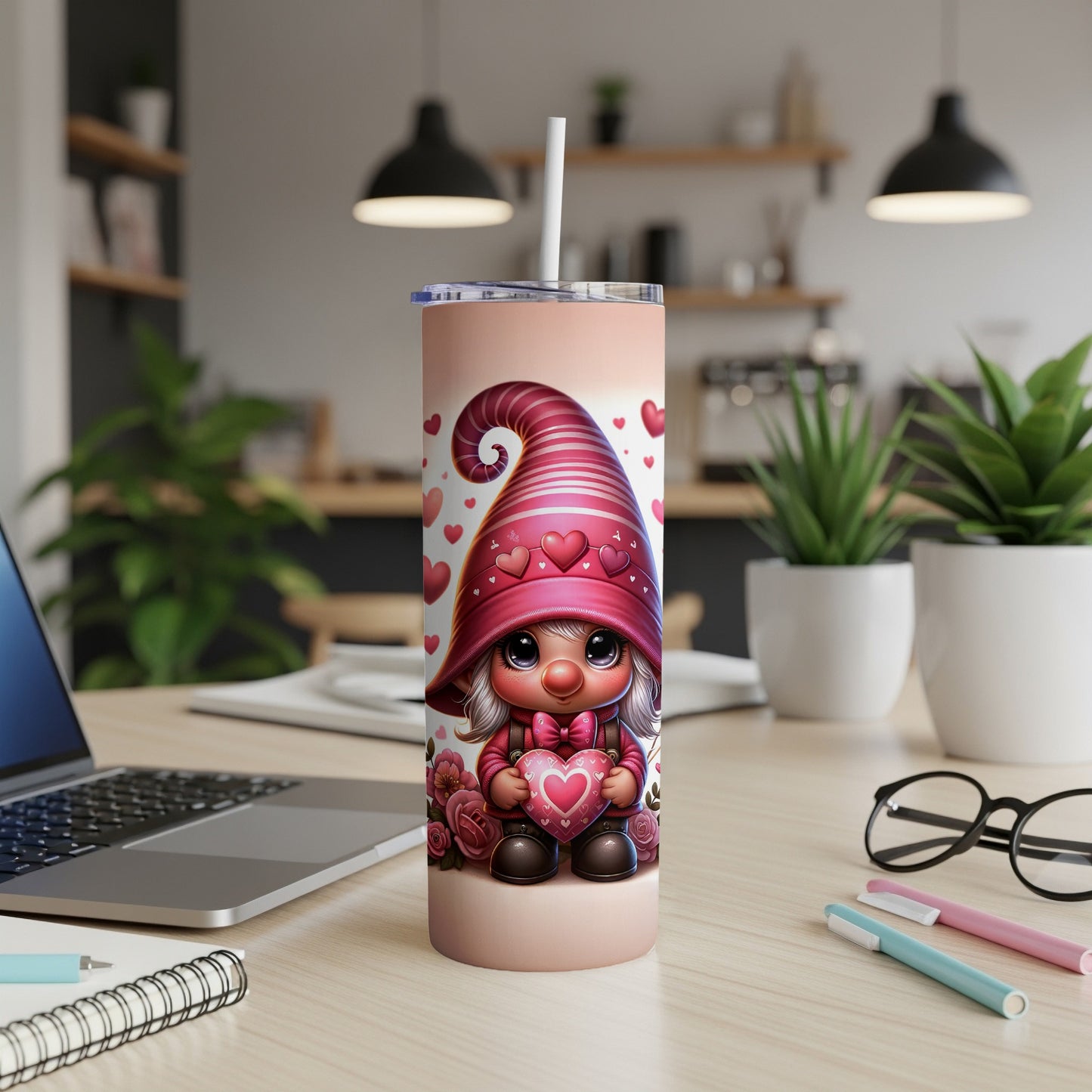 Pink gnome with hearts on tumbler and straw, holding a heart.