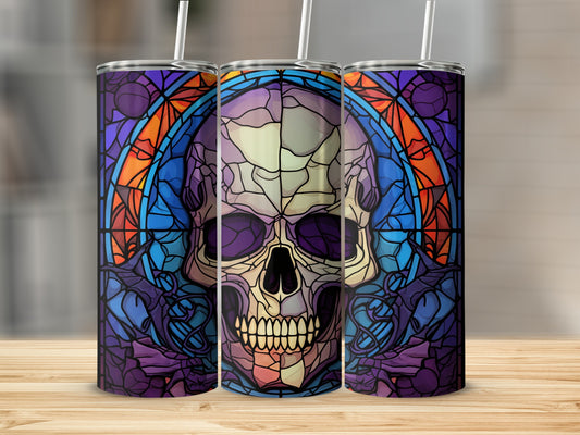 Stained glass skull tumbler with purple and blue hues.