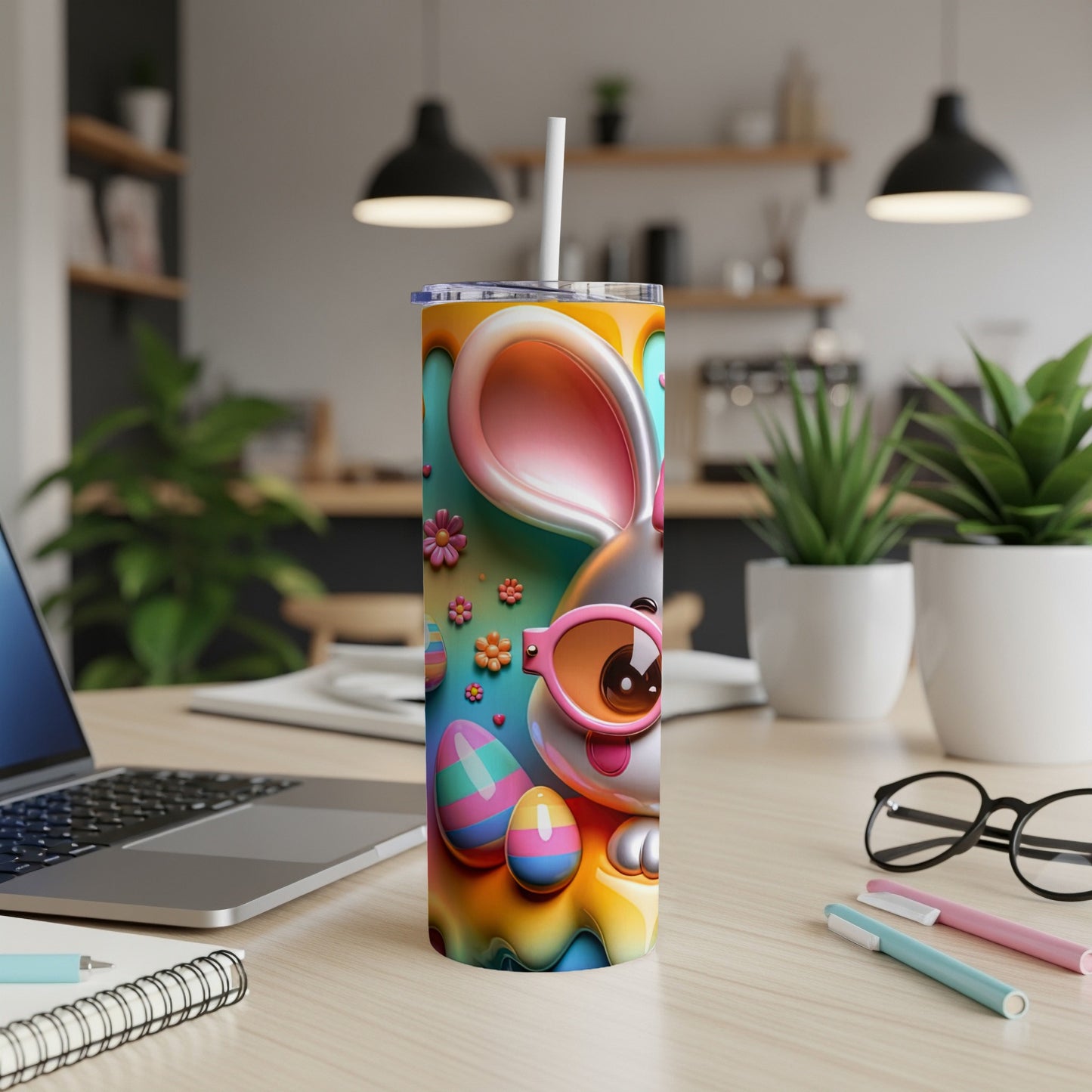 Easter bunny tumbler with colorful eggs and flowers.
