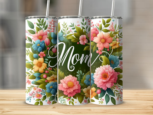 Three tumblers decorated with colorful floral designs and the word "Mom."