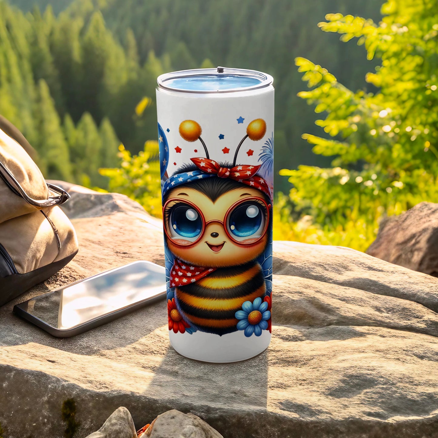 Tumbler with a cute bee wearing a bandana, sunglasses, and red, white, and blue decorations.