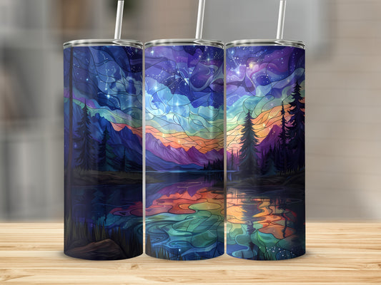 Three tumblers with a starry night sky, mountains, and lake reflection.