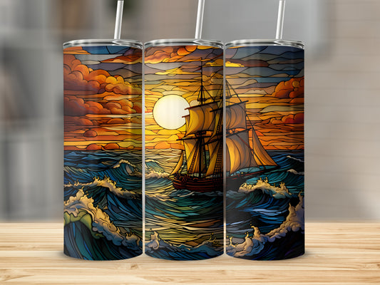 Three tall tumblers with a stained-glass sailing ship design.
