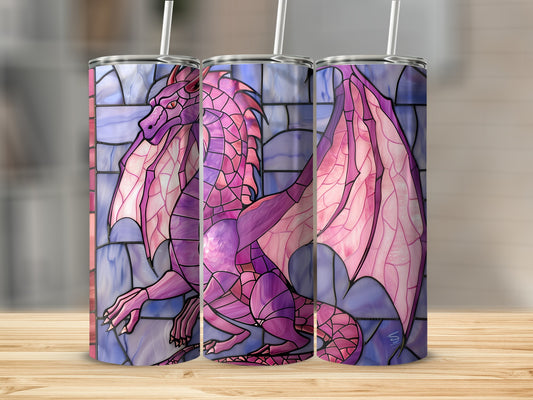 Pink stained glass dragon on a tumbler with a wooden background.