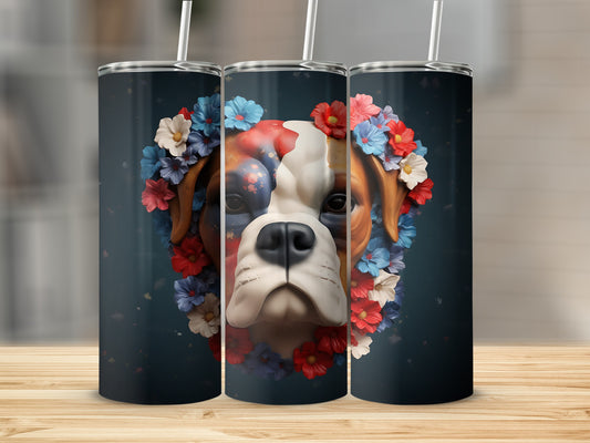 Boxer dog face adorned with red, white, and blue flowers.