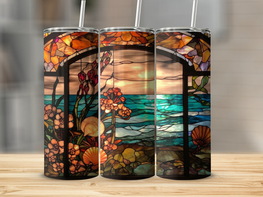 Three tumblers with stained glass seascape design featuring flowers, shells, and ocean views.