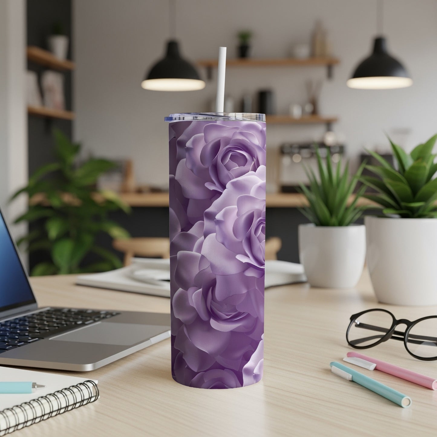 Purple rose floral pattern tumbler with white lid and straw.