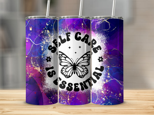 Tumbler with purple, blue, and gold abstract design and "Self Care Is Essential" with butterfly.