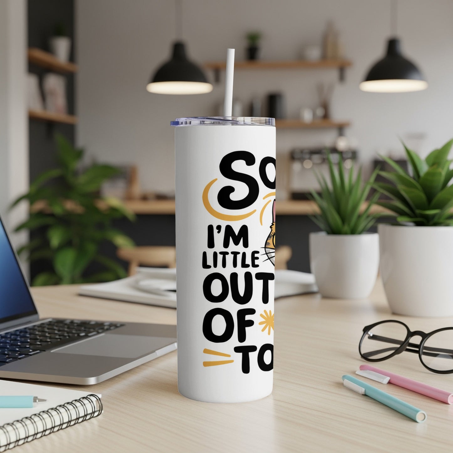 White tumbler with "So I'm little out of it" and cat graphic.