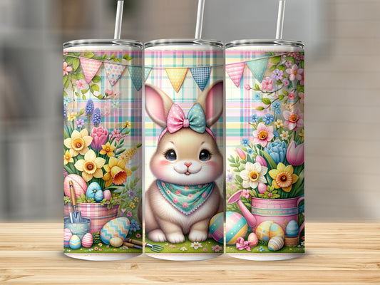 Easter bunny with basket of flowers and patterned background.
