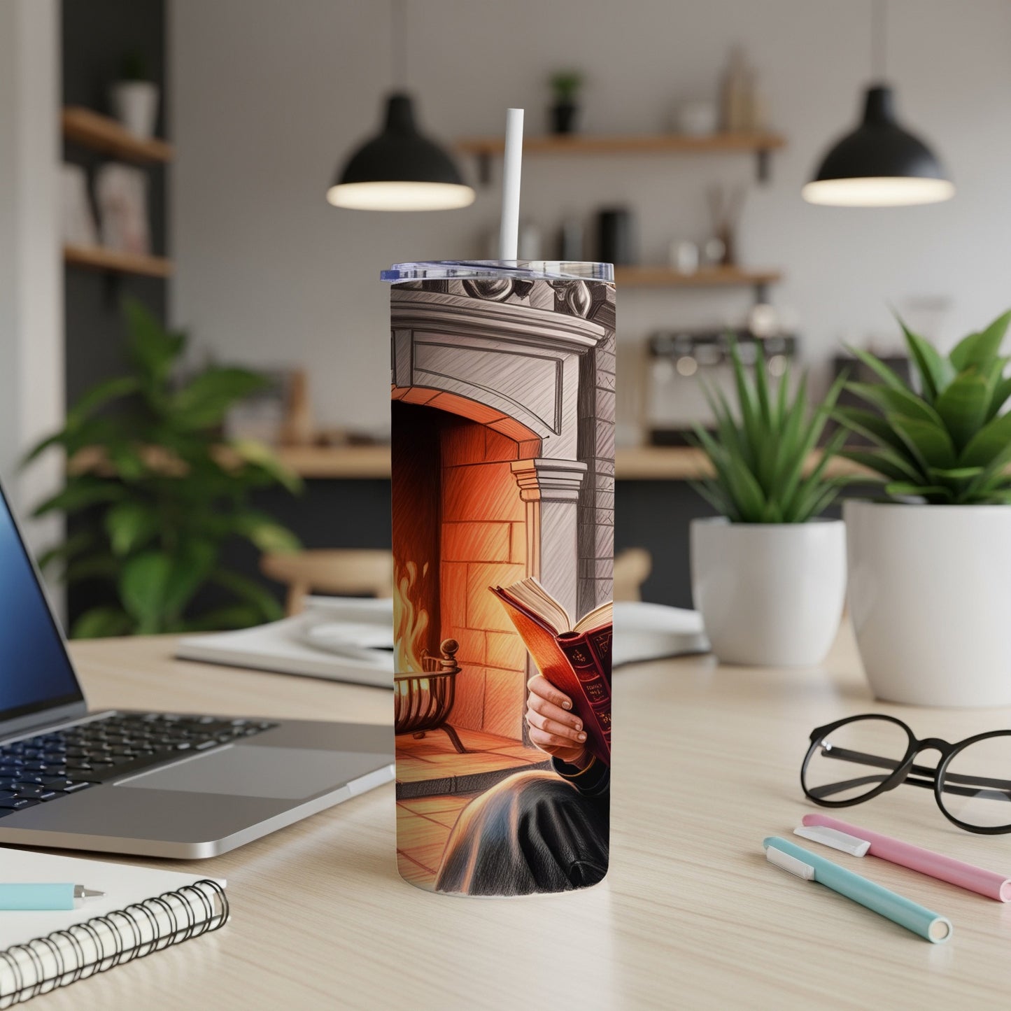 Tumbler with fireplace illustration and person reading.