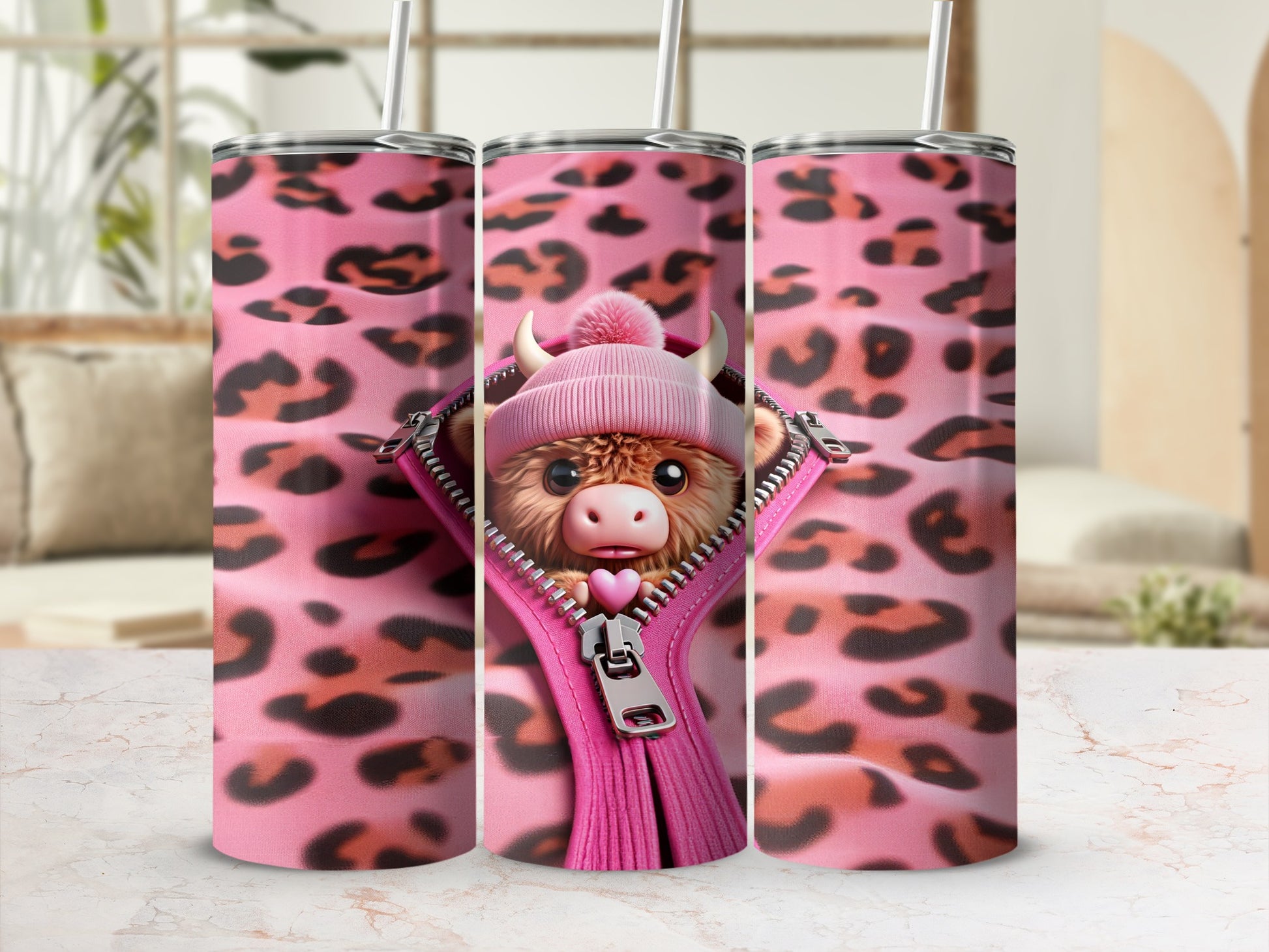 Pink leopard print tumbler with a cartoon cow wearing a pink beanie.