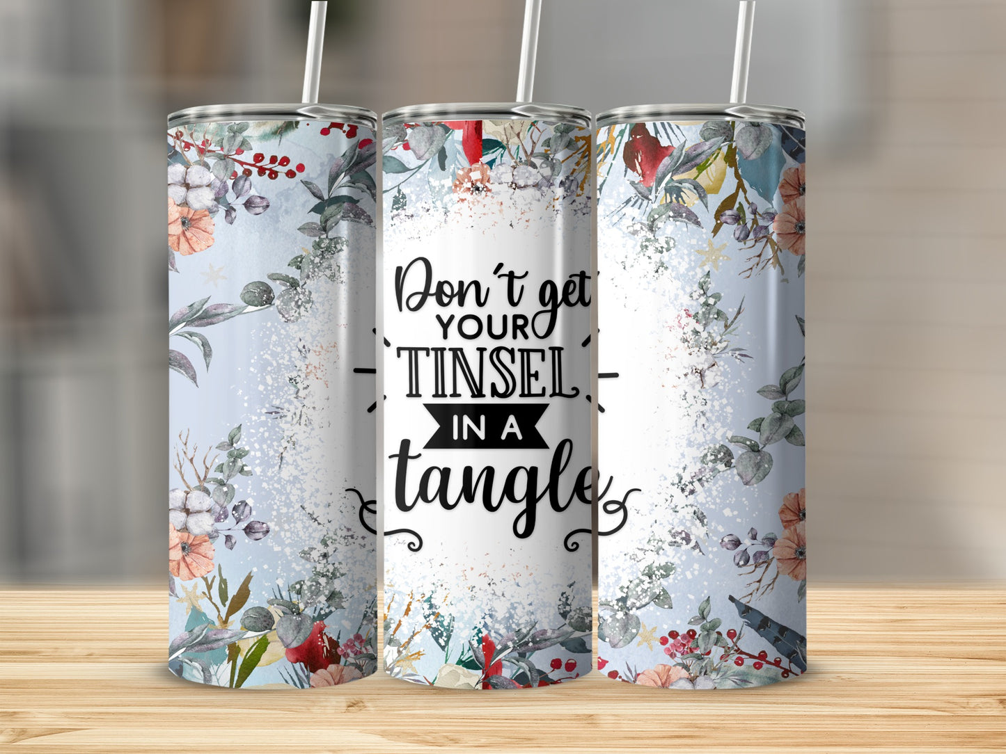 Tumbler with "Don't get yourself tangled" text and floral botanical design.