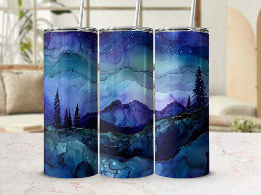 Three tumblers with a swirling blue, purple, and gold mountain landscape design.