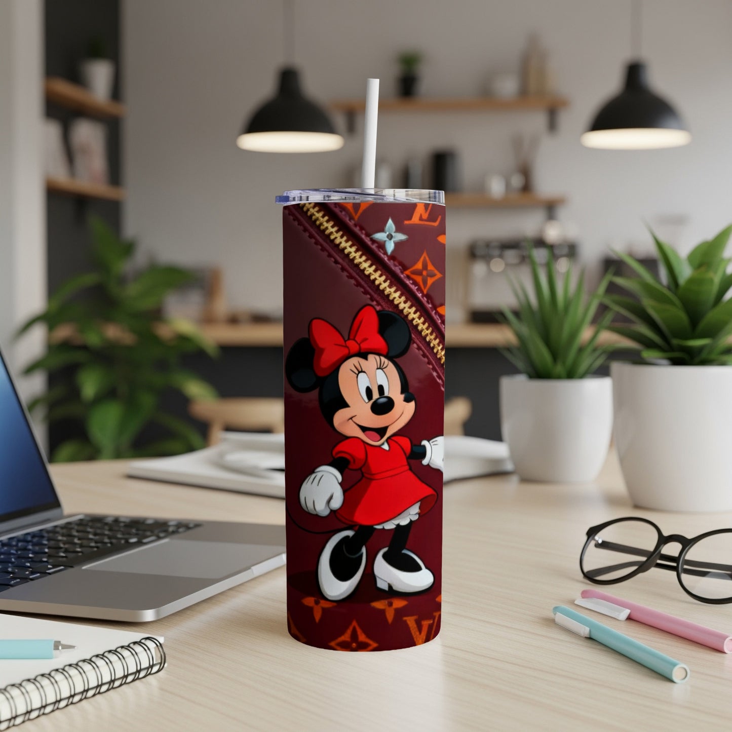 Minnie Mouse on a maroon tumbler with a zipper and LV-style pattern.