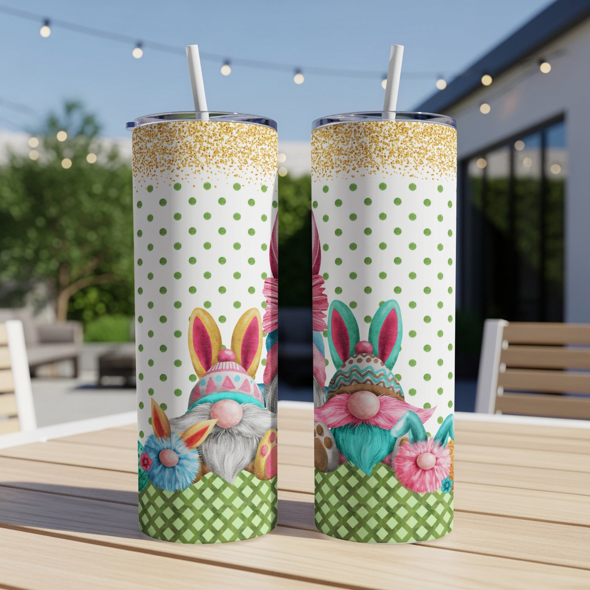 Two Easter-themed gnomes with bunny ears on polka dot tumblers.