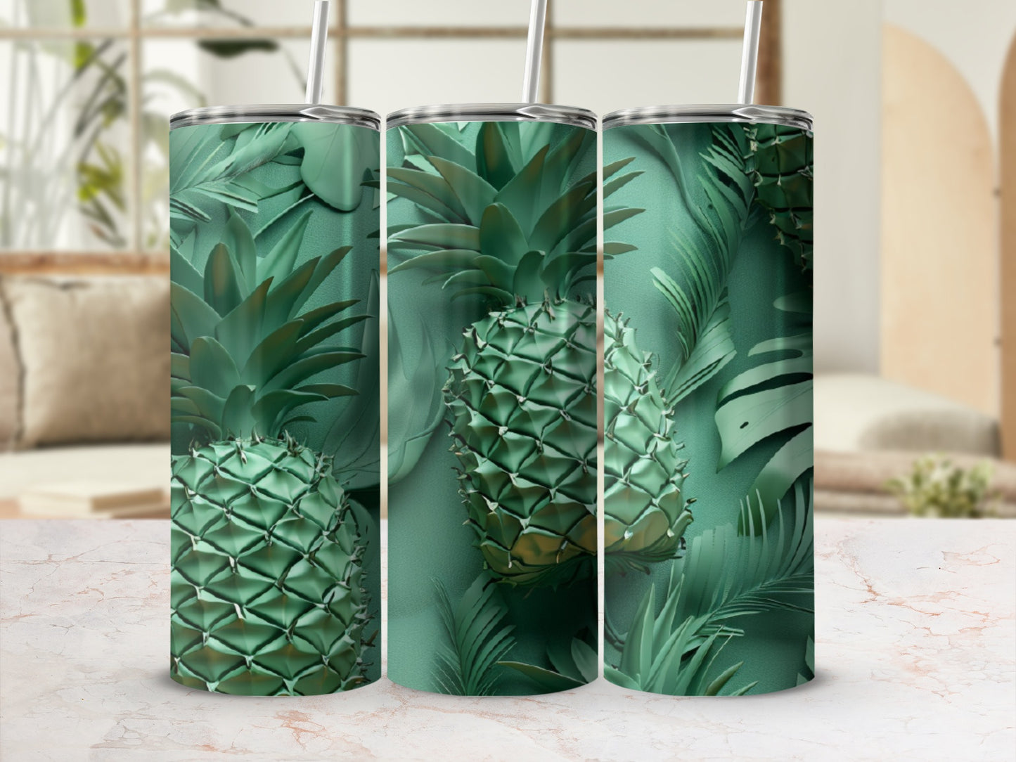Green pineapple and palm leaf patterned tumblers with straws.