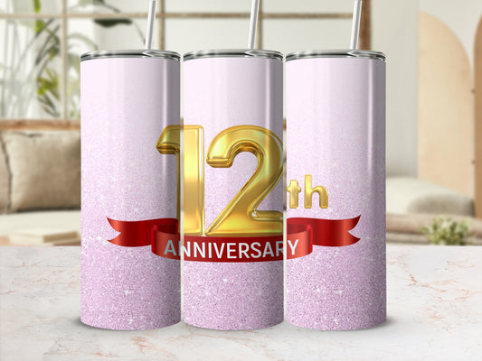 Three glitter tumblers celebrate a 12th anniversary with a red ribbon.