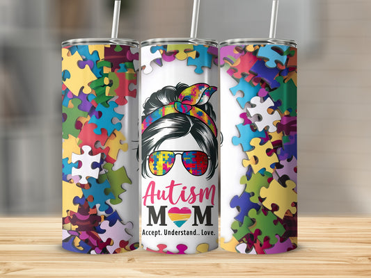 Autism Mom tumbler with puzzle pieces and sunglasses.