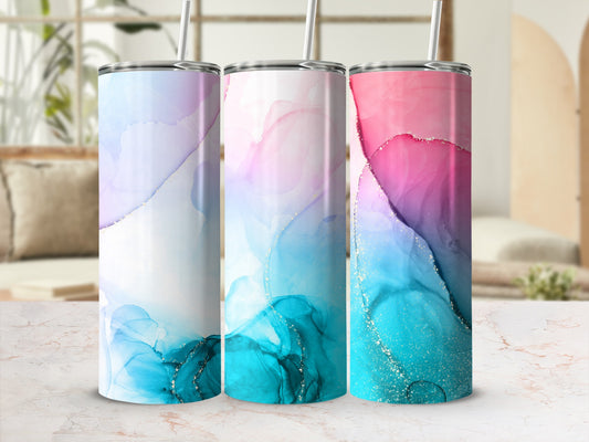 Three tumblers with marbled watercolor designs in pink, blue, and gold.