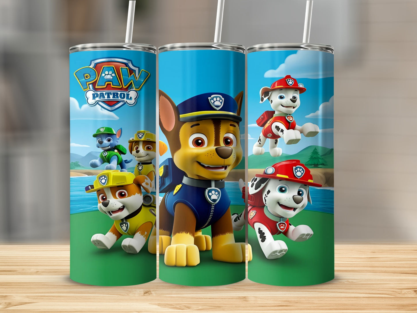 Paw Patrol characters Chase, Marshall, and Rubble on a blue background.