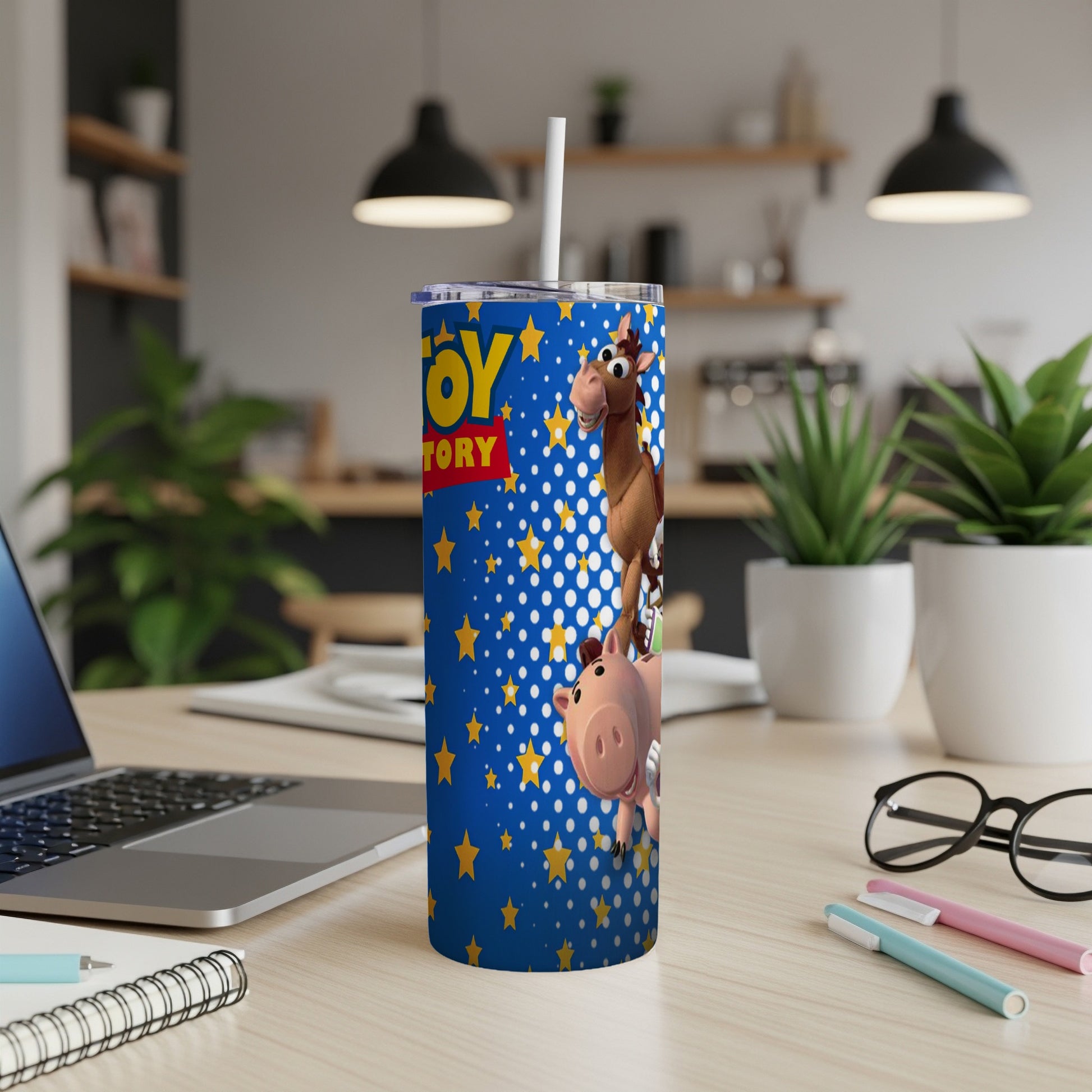 Toy Story tumbler featuring Woody, Hamm, and Rex against a blue starry background.