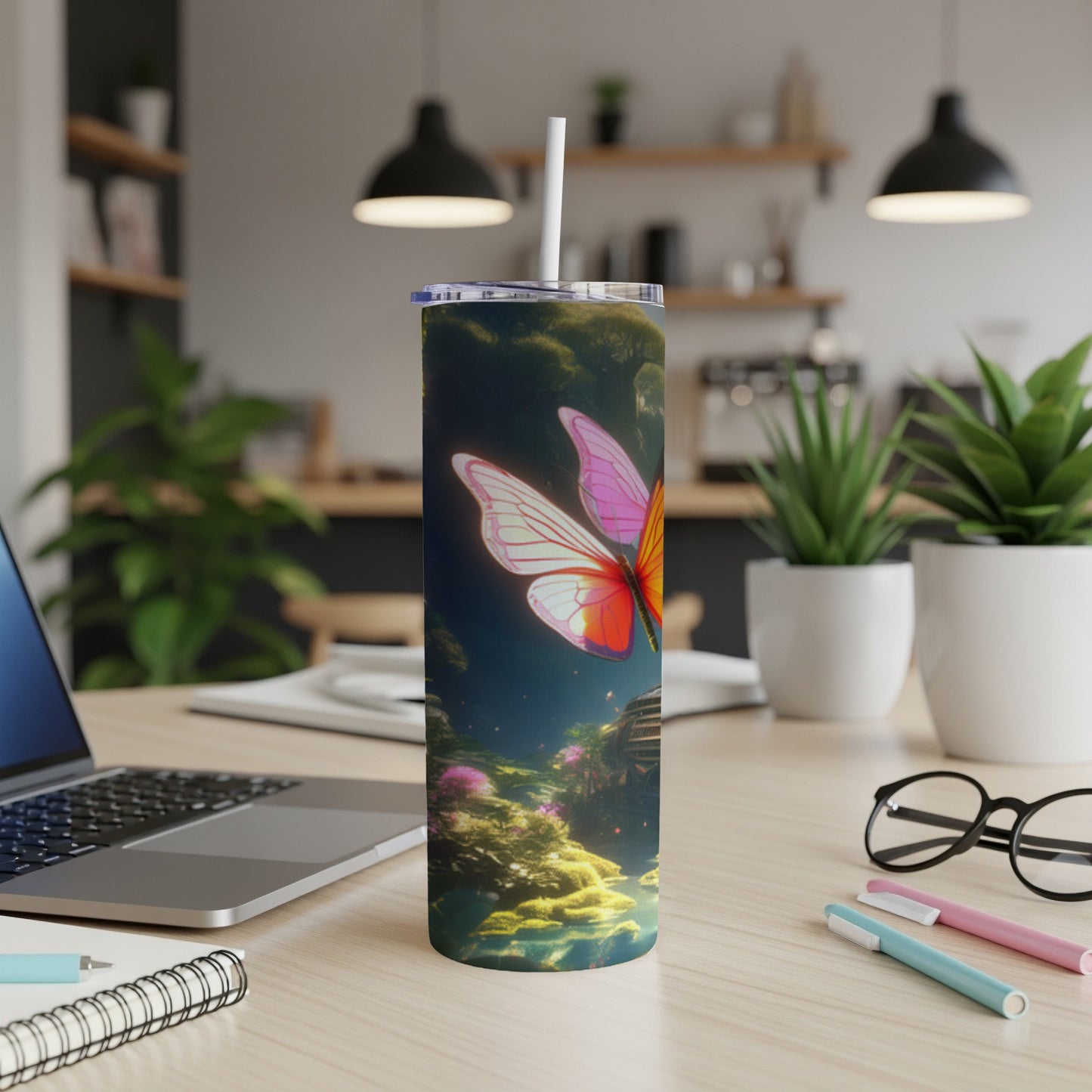 Tall tumbler with a vibrant butterfly and nature scene design.
