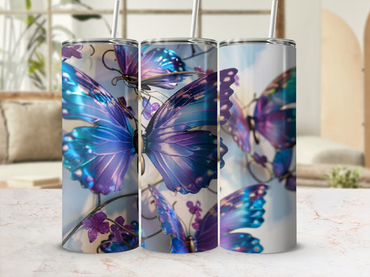 Three tumblers featuring purple and blue butterflies against a blurred background.
