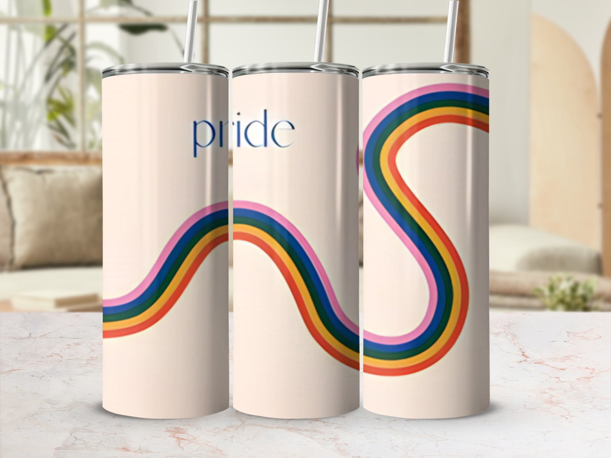 Three cream tumblers with rainbow wave design and "pride" text.