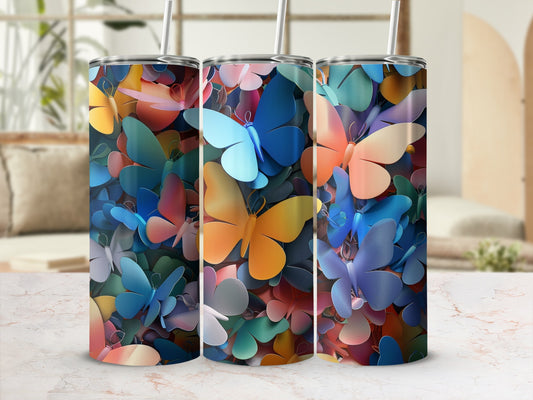Three tumblers featuring a colorful butterfly pattern on a textured surface.
