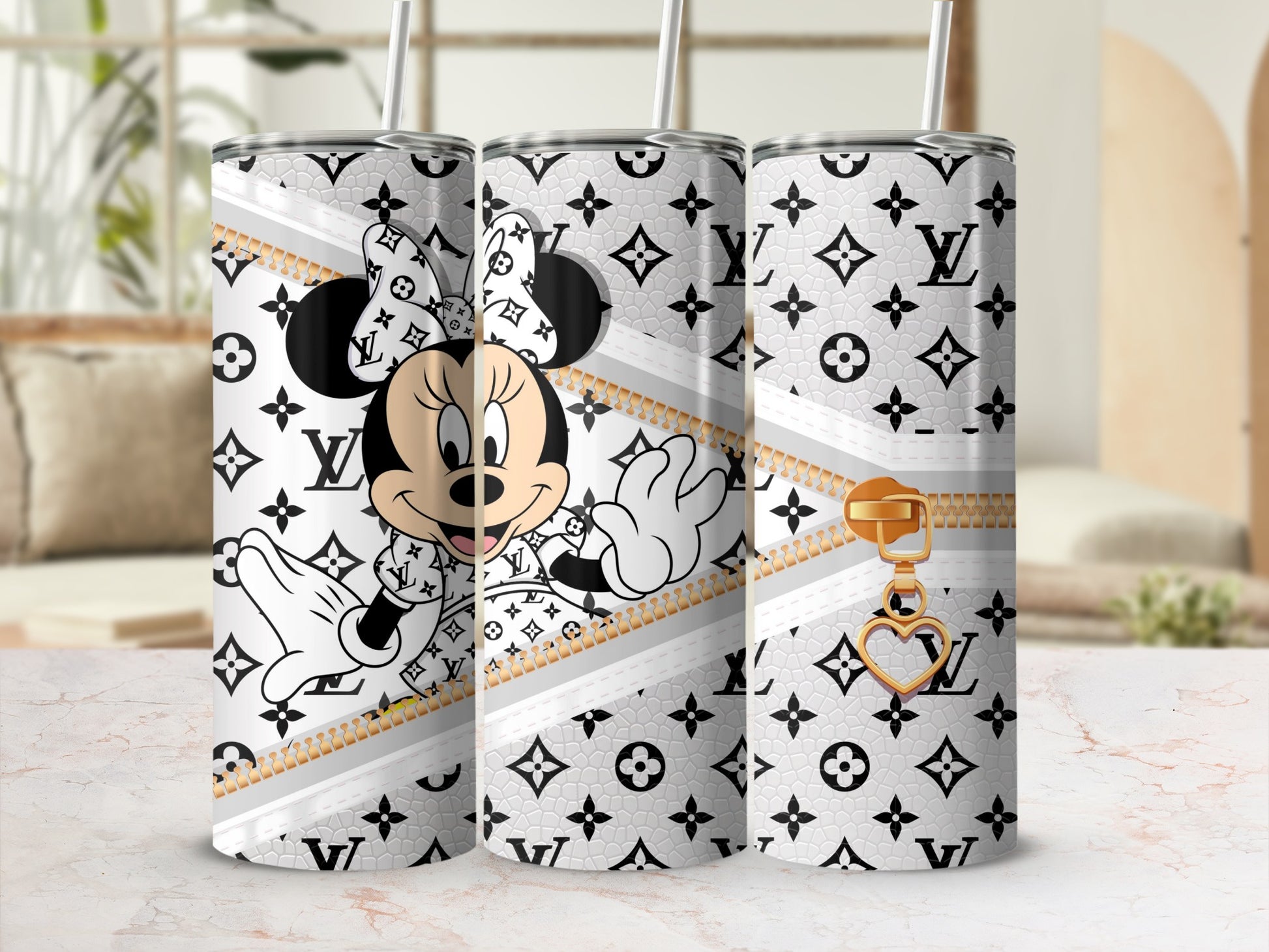 Minnie Mouse themed tumbler with gold zipper and heart charm.