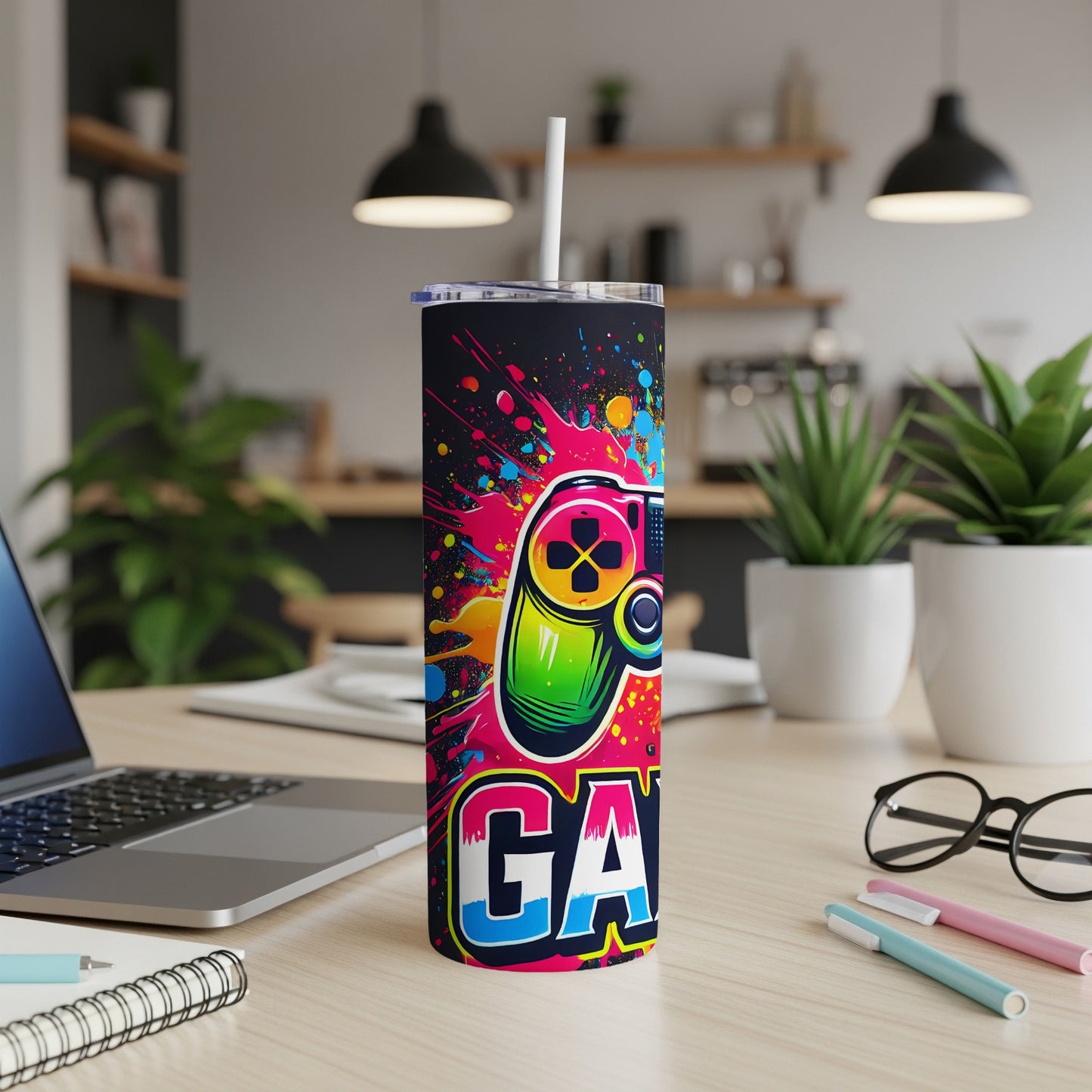 Tumbler with a colorful "GAMER" design featuring a joystick.