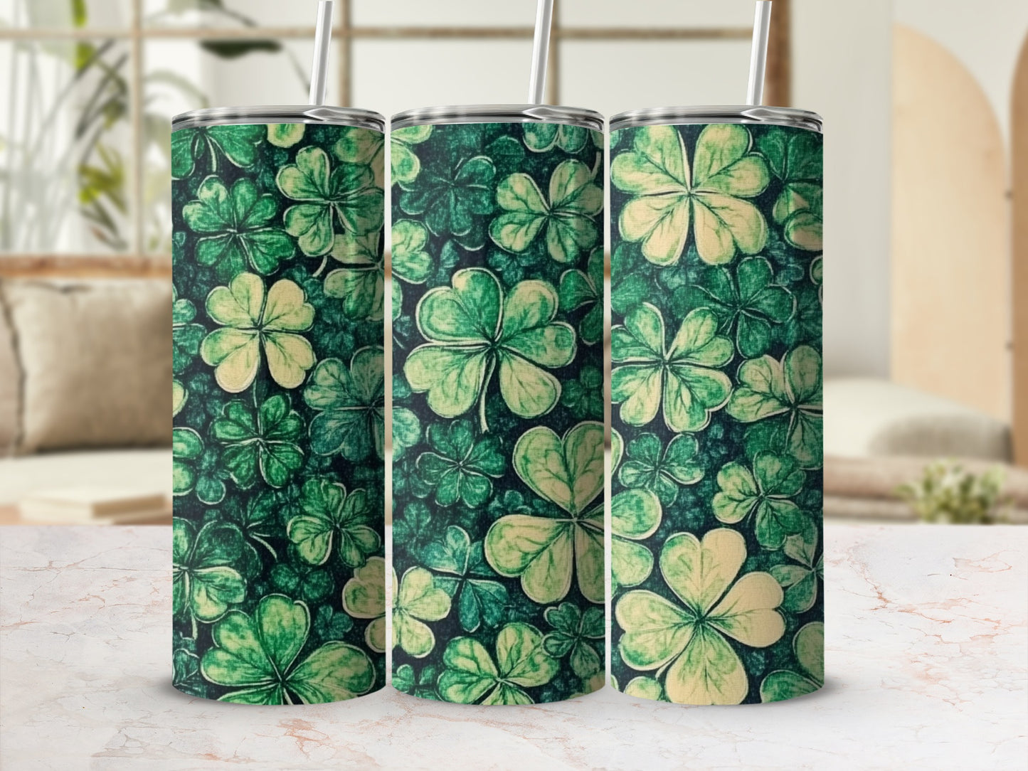 Three tumblers with a repeating pattern of green and cream shamrocks.