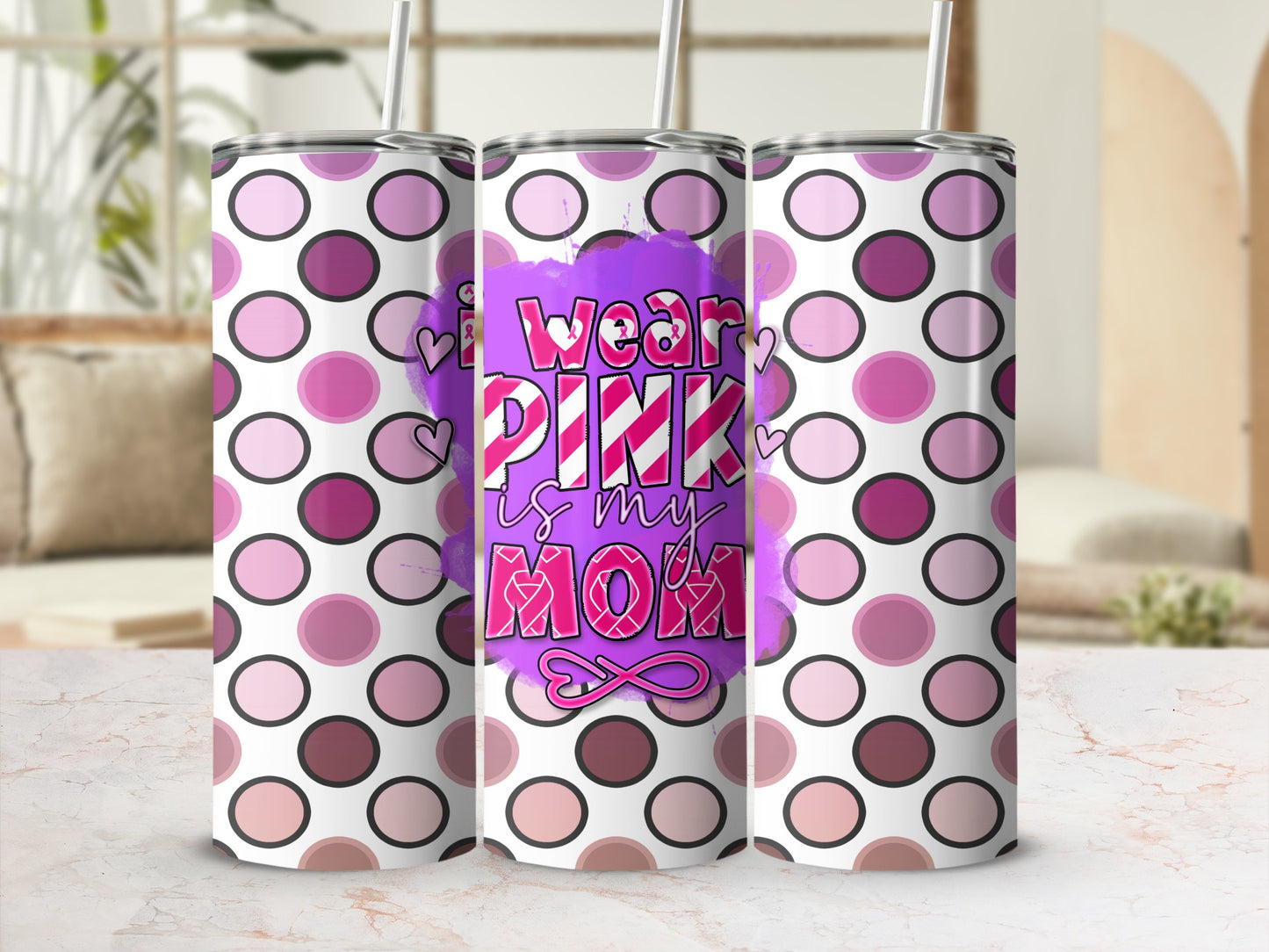 Pink and purple polka dot tumbler with "I wear pink is my mom" text.