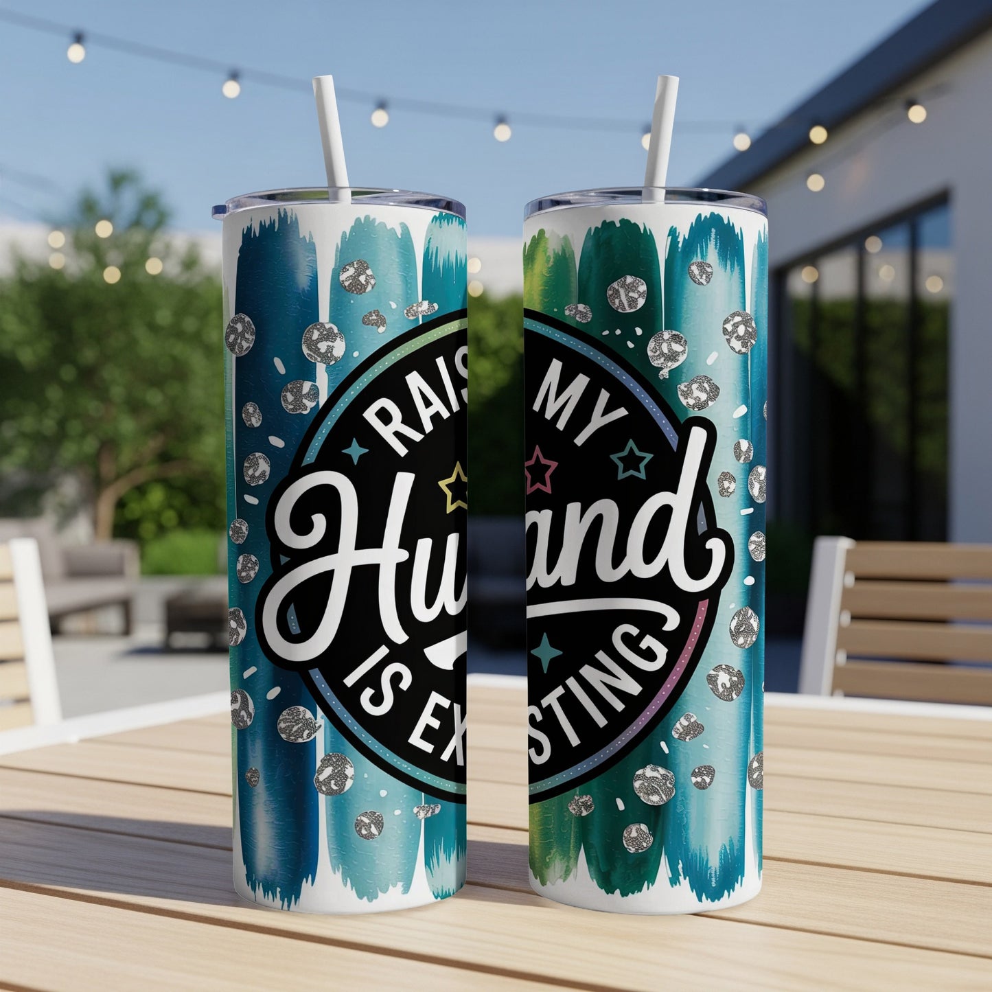 "Raising my husband is exhausting" text on two tumblers with teal and silver glitter design.