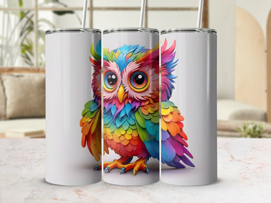 Three tumblers featuring a colorful rainbow owl design.